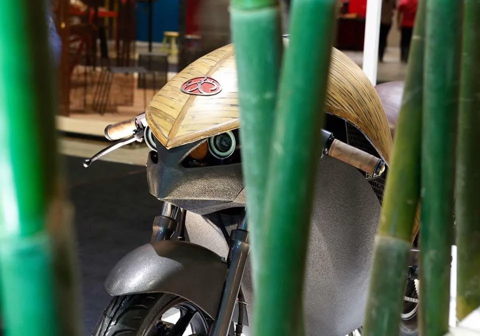 A finished Banatti surface glimpsed through bamboo