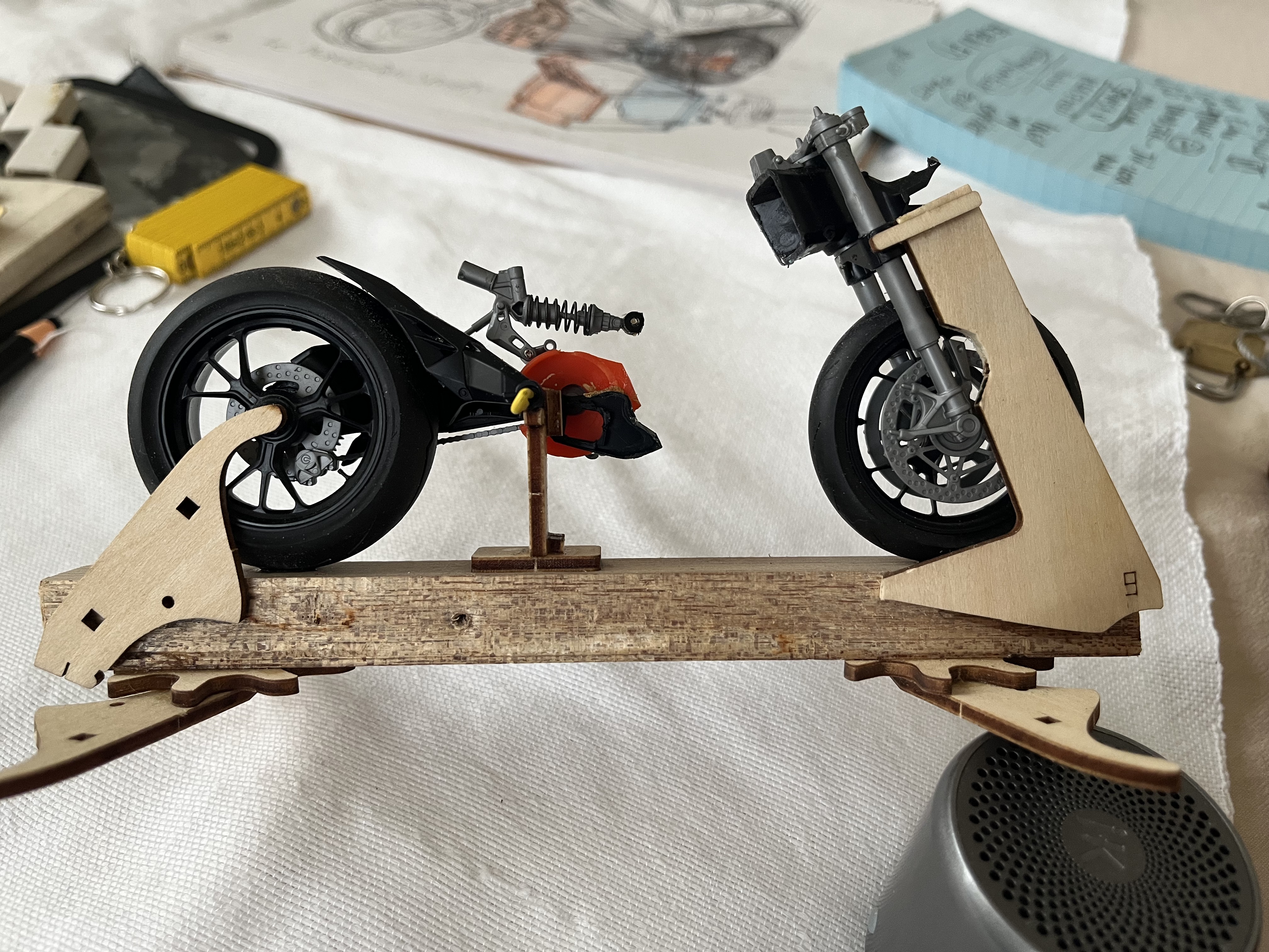 Physical Falcon model held in its wooden workshop jig